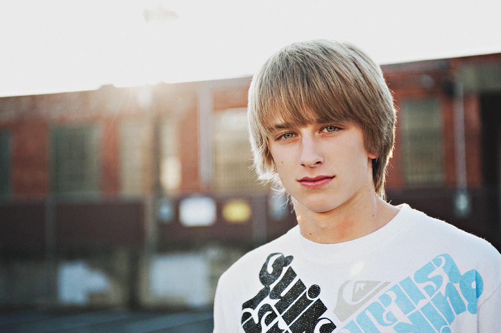 Seattle Senior Portrait Photographer captures Liberty High School senior Kramer at the Olympic Scultpure Park in warm evening light.