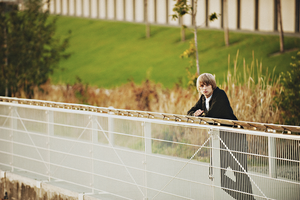 Seattle Senior Portrait Photographer captures Liberty High School senior Kramer at the Olympic Scultpure Park in warm evening light.